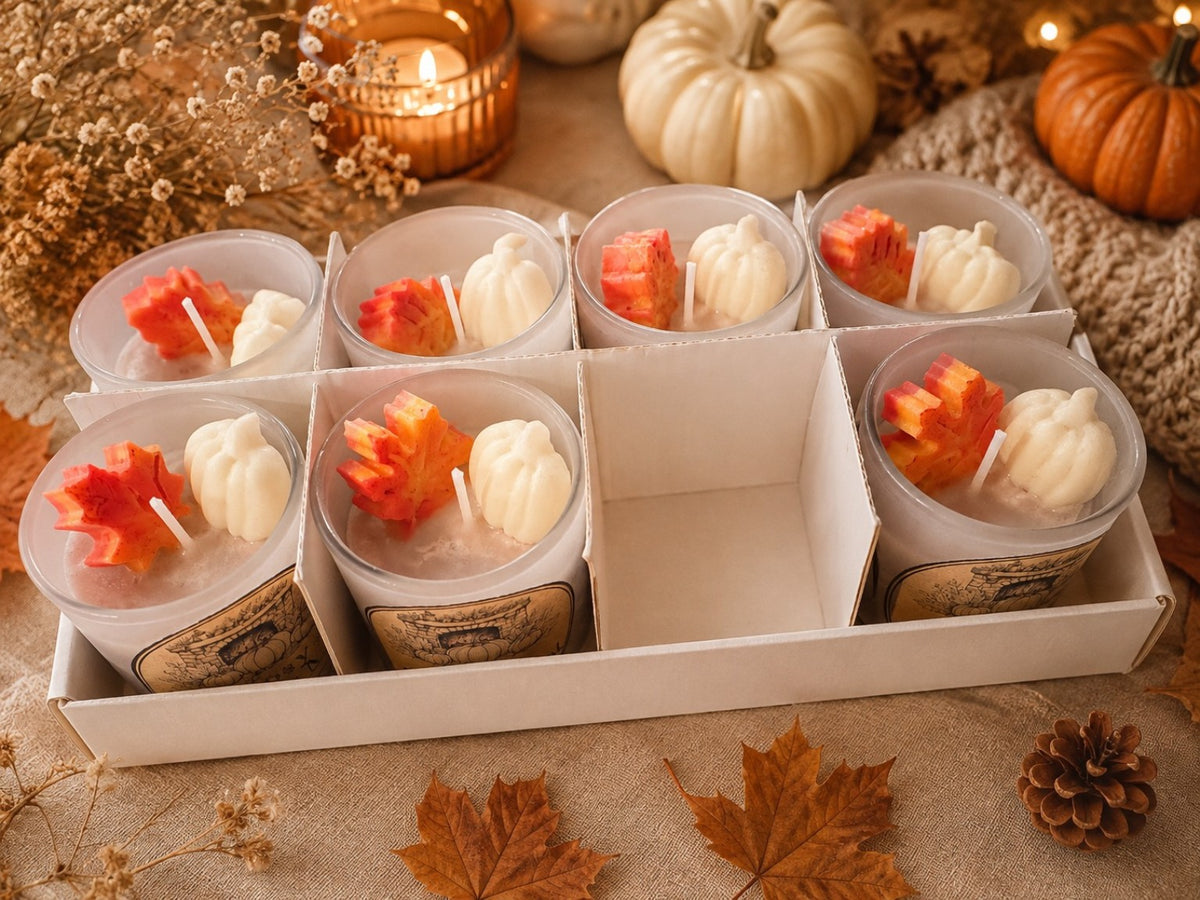 Batch of handmade Cosy Fireplace autumn candles with pumpkin and leaf wax details