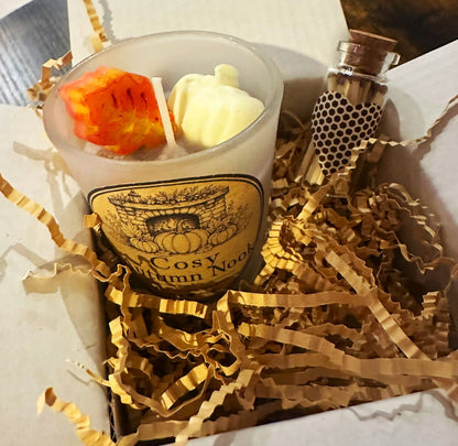 Boxed Cosy Fireplace autumn candle with white pumpkin wax detail and bottle of matches