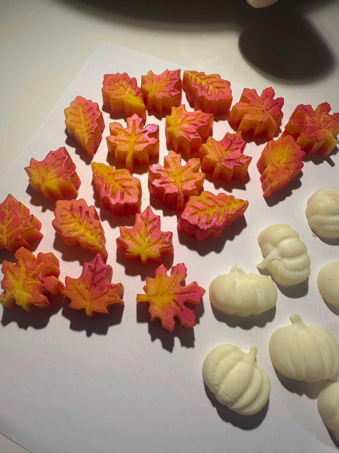 Orange autumn leaf and white pumpkin wax embeds for handmade Cosy Fireplace candle