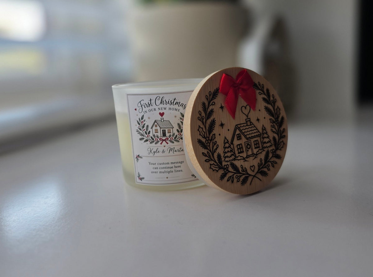 Personalised First Christmas in Our New Home candle with engraved wooden lid and red bow