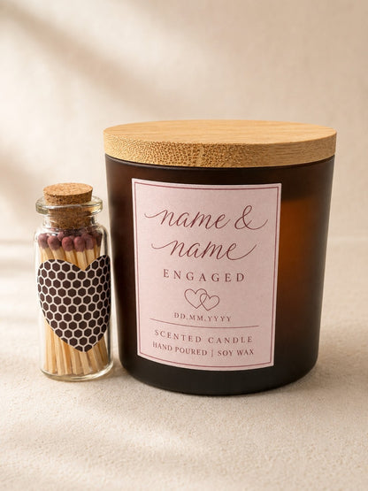 Personalised engagement candle with couple names and bottle of matches