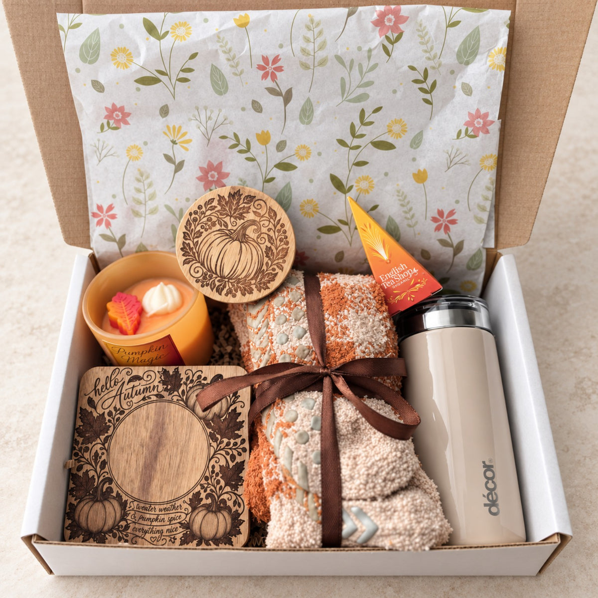 September care package gift box with pumpkin candle, autumn socks, acacia coaster, mini thermos and flavoured tea